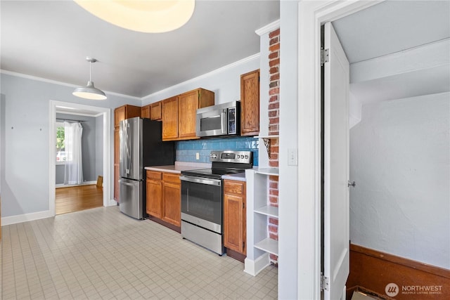912 Highland Dr, Wenatchee, WA 98801 - kitchen featuring stainless steel appliances, brown cabinets, light countertops, tasteful backsplash, and crown molding