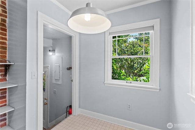 912 Highland Dr, Wenatchee, WA 98801 - entryway with ornamental molding, baseboards, electric panel, and tile patterned floors