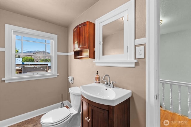912 Highland Dr, Wenatchee, WA 98801 - bathroom with vanity, toilet, and baseboards