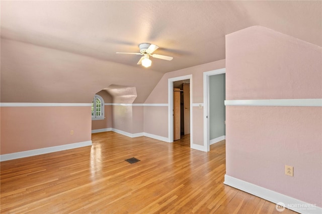 912 Highland Dr, Wenatchee, WA 98801 - bonus room featuring a ceiling fan, light wood-style flooring, lofted ceiling, and baseboards
