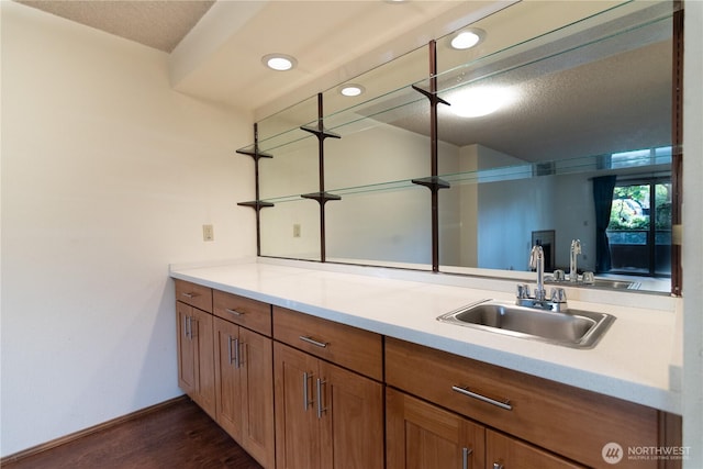 3421 SW Roxbury St Unit 106, Seattle, WA 98126 - bathroom featuring wood finished floors, vanity, recessed lighting, and baseboards