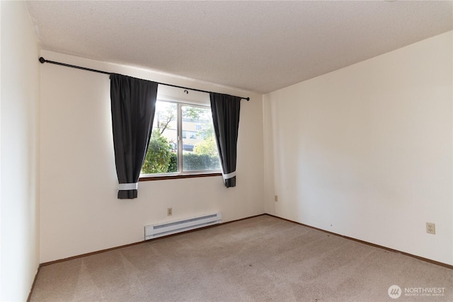3421 SW Roxbury St Unit 106, Seattle, WA 98126 - carpeted spare room with a baseboard radiator and baseboards