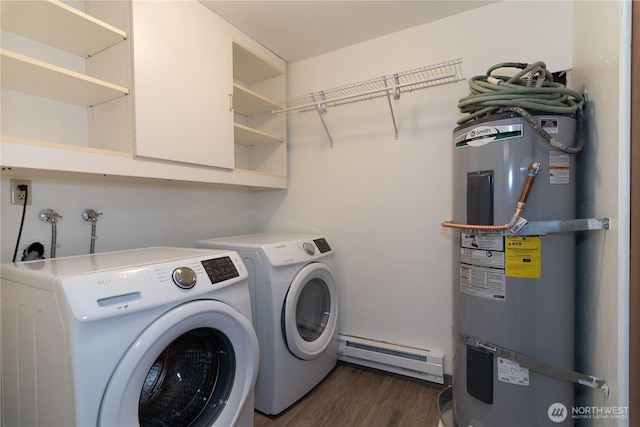 3421 SW Roxbury St Unit 106, Seattle, WA 98126 - washroom with baseboard heating, strapped water heater, separate washer and dryer, and dark wood-style floors