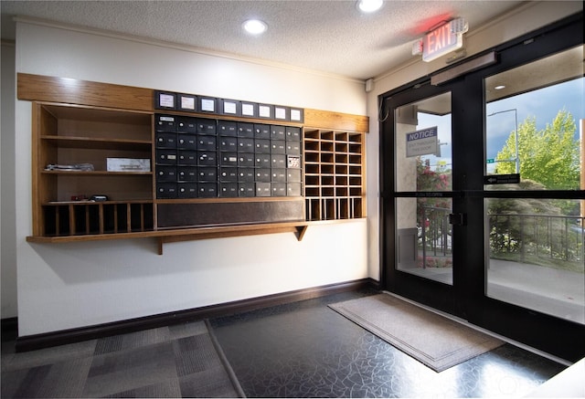 3421 SW Roxbury St Unit 106, Seattle, WA 98126 - surrounding community with a textured ceiling, mail area, and recessed lighting