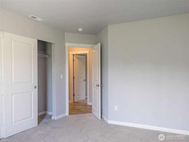 41 Kates Ct, Port Angeles, WA 98362 - unfurnished bedroom featuring carpet flooring, baseboards, and a closet
