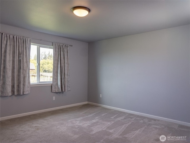 41 Kates Ct, Port Angeles, WA 98362 - spare room featuring baseboards and carpet
