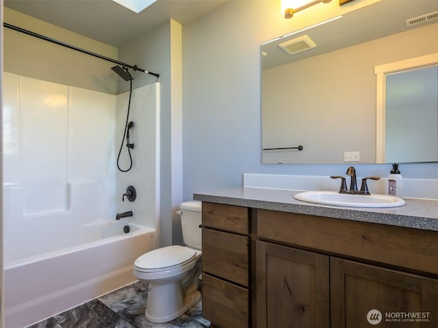 41 Kates Ct, Port Angeles, WA 98362 - full bath with toilet, vanity, shower / washtub combination, and a skylight