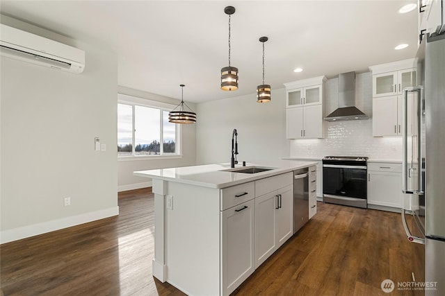 5942LOT47 Ranch Loop, Ferndale, WA 98248 - kitchen with wall chimney exhaust hood, appliances with stainless steel finishes, a sink, a wall mounted AC, and tasteful backsplash