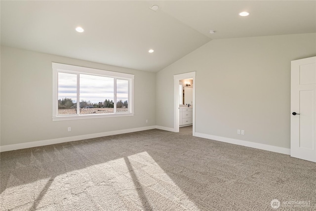 5942LOT47 Ranch Loop, Ferndale, WA 98248 - unfurnished bedroom featuring carpet, lofted ceiling, recessed lighting, baseboards, and ensuite bath