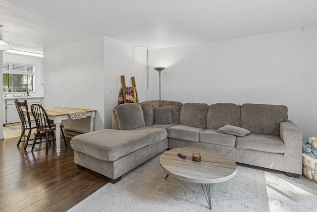 2209 Mciver Ct SW, Tumwater, WA 98512 - living area with wood finished floors and baseboard heating