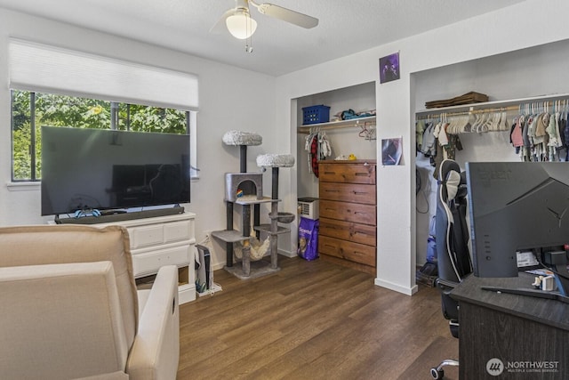 2209 Mciver Ct SW, Tumwater, WA 98512 - home office featuring a ceiling fan, wood finished floors, and baseboards