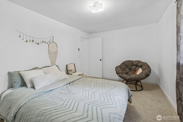 2209 Mciver Ct SW, Tumwater, WA 98512 - bedroom with a textured ceiling, carpet floors, and baseboards