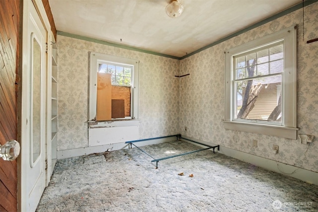 208 Carolina St, Bellingham, WA 98225 - unfurnished room with crown molding and wallpapered walls