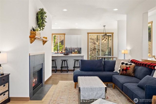 720 Stone Ridge Dr, Cle Elum, WA 98922 - living area featuring light wood finished floors, recessed lighting, and a fireplace