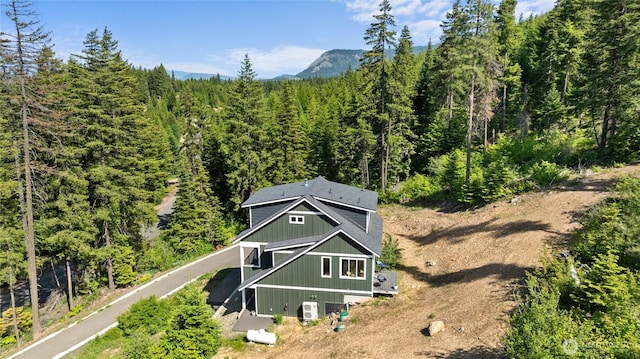 720 Stone Ridge Dr, Cle Elum, WA 98922 - view from above of property with a forest and a mountain backdrop