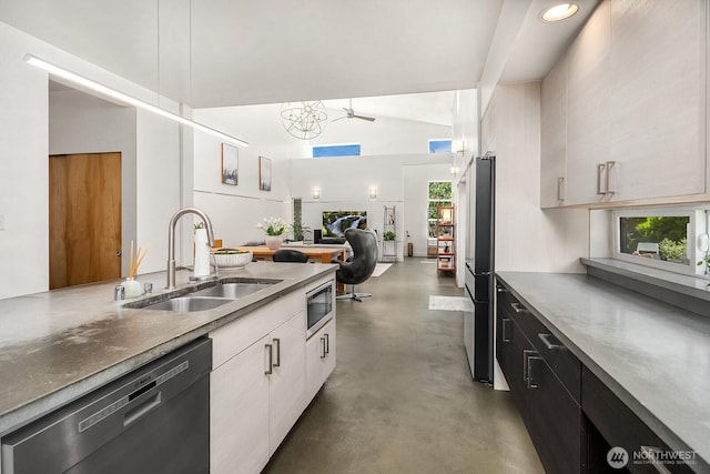 8622 NE 177th Pl, Bothell, WA 98011 - kitchen with a sink, stainless steel appliances, finished concrete flooring, high vaulted ceiling, and modern cabinets