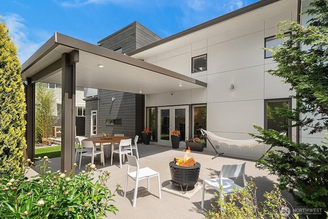 8622 NE 177th Pl, Bothell, WA 98011 - view of patio featuring a fire pit and french doors