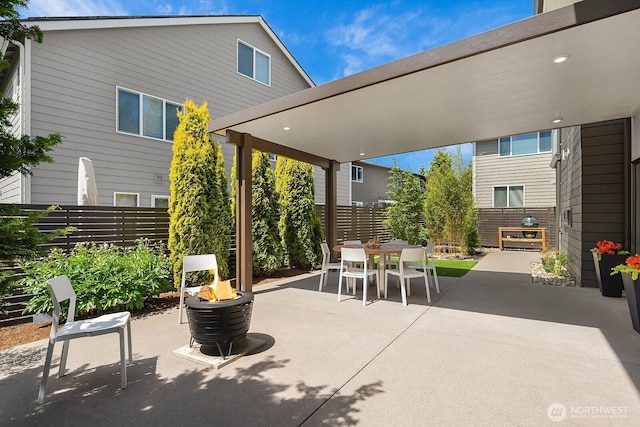 8622 NE 177th Pl, Bothell, WA 98011 - fenced backyard with outdoor dining area, a patio area, and an outdoor fire pit