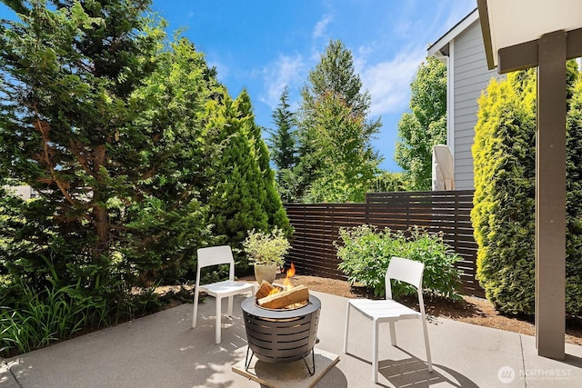 8622 NE 177th Pl, Bothell, WA 98011 - view of patio / terrace featuring a fire pit