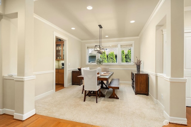 27528 SE 28th Ct, Sammamish, WA 98075 - dining room featuring crown molding, recessed lighting, baseboards, light wood-style floors, and light colored carpet