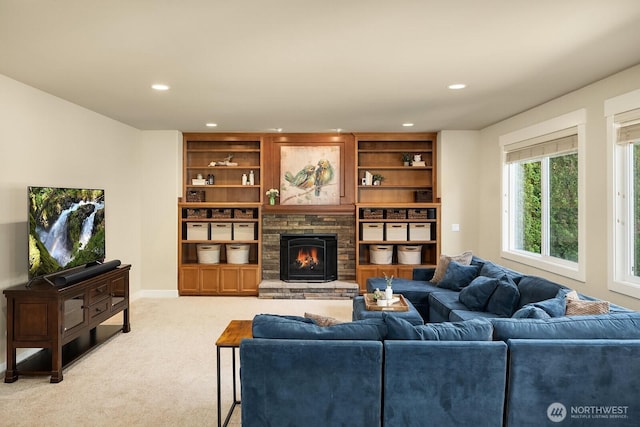27528 SE 28th Ct, Sammamish, WA 98075 - living area featuring recessed lighting, light carpet, and a stone fireplace
