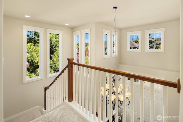 27528 SE 28th Ct, Sammamish, WA 98075 - stairs with plenty of natural light, recessed lighting, carpet flooring, baseboards, and a chandelier