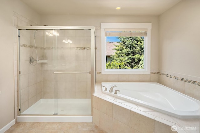 27528 SE 28th Ct, Sammamish, WA 98075 - full bathroom featuring a bath, a shower stall, tile patterned floors, and recessed lighting
