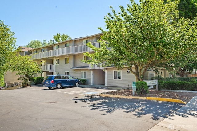 18200 73rd Ave NE Unit B205, Kenmore, WA 98028 - view of property featuring uncovered parking