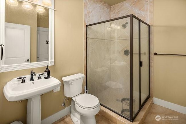 28816 118th Ave SE, Auburn, WA 98092 - full bath featuring toilet, a stall shower, and baseboards