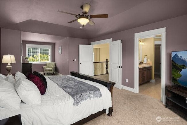 28816 118th Ave SE, Auburn, WA 98092 - bedroom featuring light carpet, baseboards, ensuite bath, and a ceiling fan