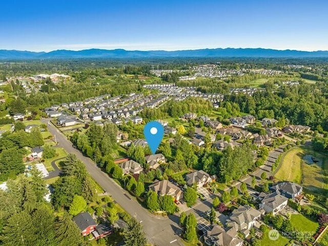 28816 118th Ave SE, Auburn, WA 98092 - aerial overview of property's location featuring a mountainous background and nearby suburban area