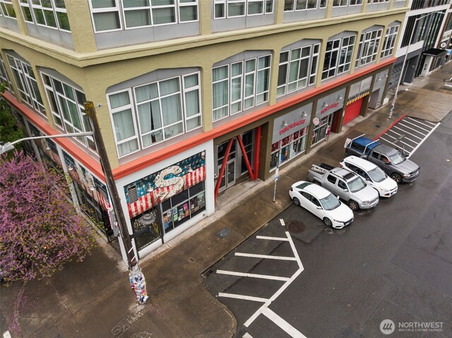 1505 11th Ave Unit 310, Seattle, WA 98122 - view of building exterior with uncovered parking