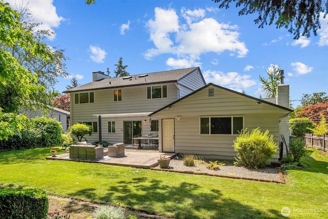 15406 NE 3rd Pl, Bellevue, WA 98007 - back of property with a chimney, an outdoor hangout area, and a patio area