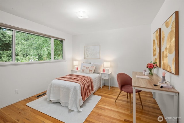 15406 NE 3rd Pl, Bellevue, WA 98007 - bedroom with light wood-style flooring and baseboards