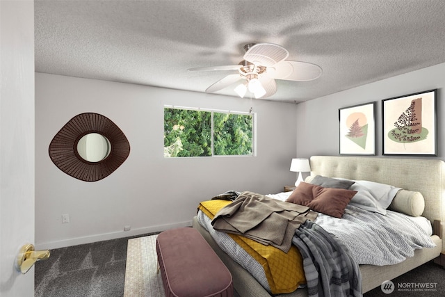 8539 University Point Cir NE, Bremerton, WA 98311 - bedroom featuring carpet floors, a textured ceiling, baseboards, and ceiling fan