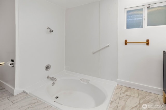 8539 University Point Cir NE, Bremerton, WA 98311 - full bathroom featuring a tub to relax in, marble finish flooring, and baseboards