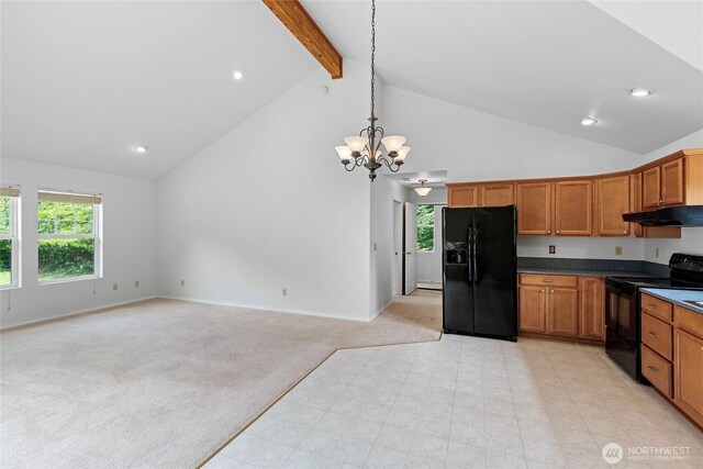 8000 NE W Port Madison Rd, Bainbridge Island, WA 98110 - kitchen with black appliances, under cabinet range hood, light carpet, a chandelier, and high vaulted ceiling