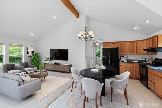 8000 NE W Port Madison Rd, Bainbridge Island, WA 98110 - kitchen with black appliances, under cabinet range hood, light tile patterned floors, high vaulted ceiling, and open floor plan