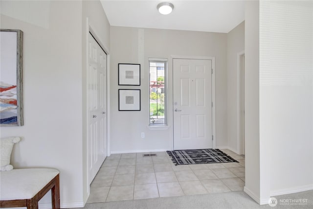 910 Medical Center Dr Unit E101, Arlington, WA 98223 - entryway with light tile patterned floors and baseboards