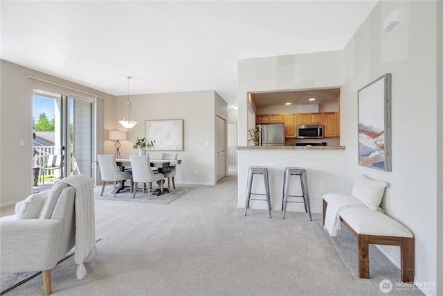 910 Medical Center Dr Unit E101, Arlington, WA 98223 - living room with light colored carpet and baseboards