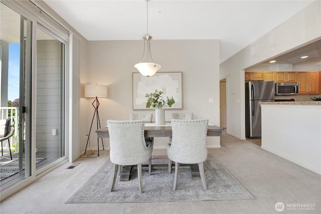 910 Medical Center Dr Unit E101, Arlington, WA 98223 - dining room featuring light carpet and baseboards