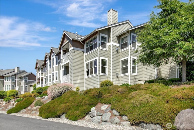 910 Medical Center Dr Unit E101, Arlington, WA 98223 - view of side of home with a chimney