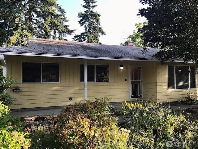 7613 12th Way, Olympia, WA 98516 - bungalow with a chimney and a shingled roof