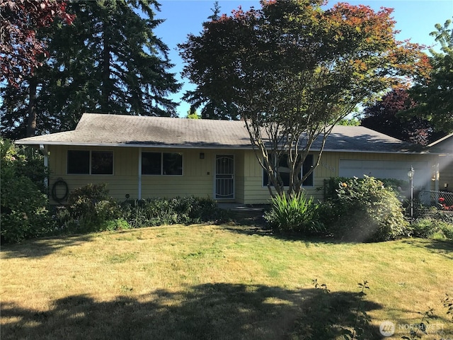 7613 12th Way, Olympia, WA 98516 - ranch-style home with an attached garage and a front lawn