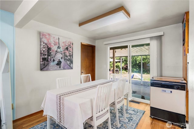 28624 27th Pl S, Federal Way, WA 98003 - dining area featuring wood finished floors and arched walkways