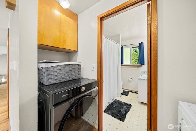 28624 27th Pl S, Federal Way, WA 98003 - laundry room featuring cabinet space and tile patterned floors