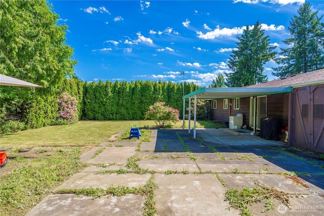 28624 27th Pl S, Federal Way, WA 98003 - view of green lawn with driveway and a carport