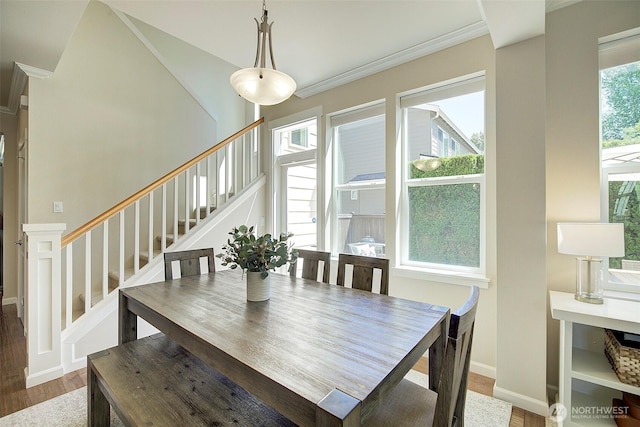 24817 SE 13th Pl, Sammamish, WA 98075 - dining room with ornamental molding, wood finished floors, stairway, and baseboards