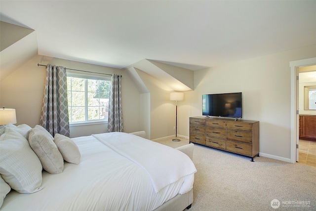 24817 SE 13th Pl, Sammamish, WA 98075 - bedroom with baseboards, light carpet, vaulted ceiling, and ensuite bath