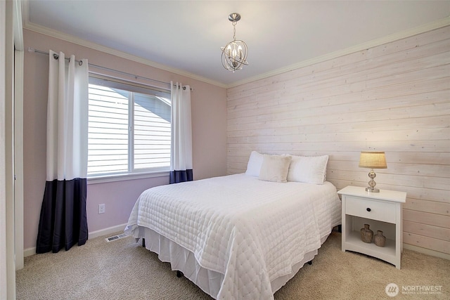 24817 SE 13th Pl, Sammamish, WA 98075 - bedroom featuring light colored carpet, wooden walls, ornamental molding, a chandelier, and baseboards